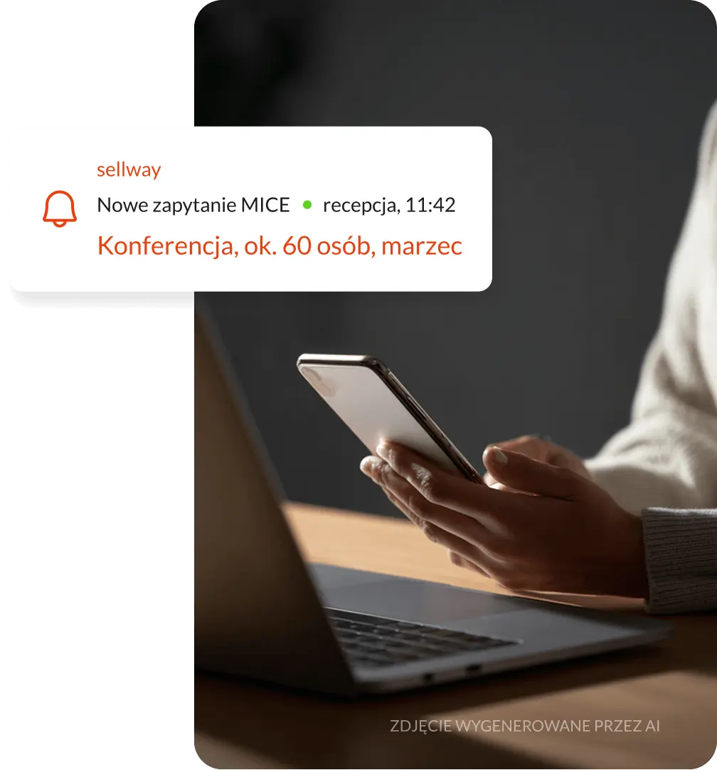 Telefon w dłoni z powiadomieniem Sellway o nowym zapytaniu MICE